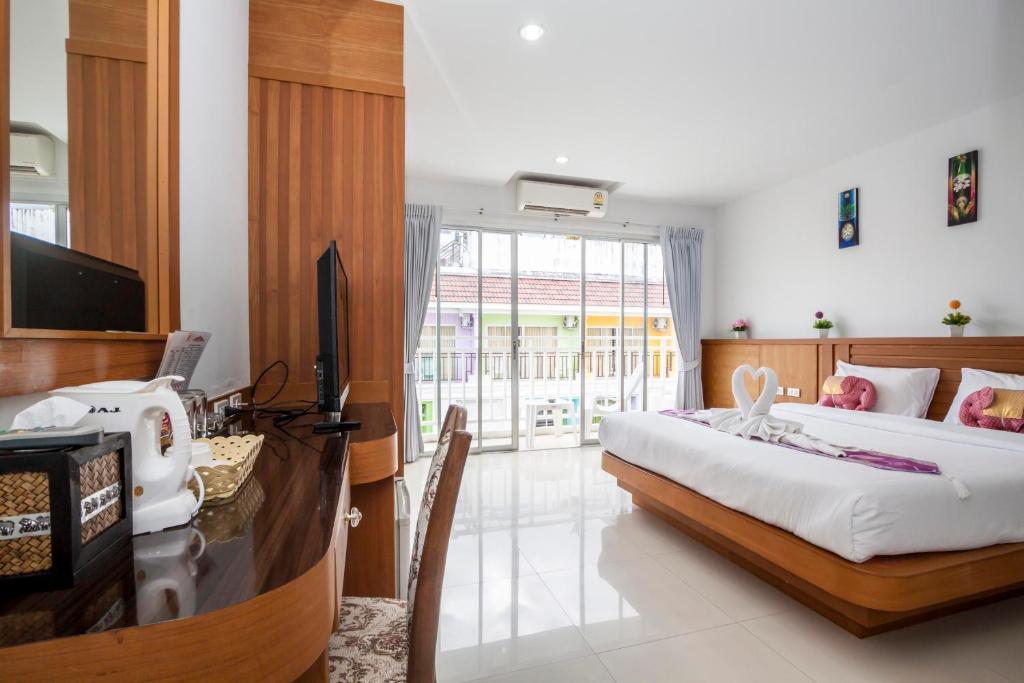 Larn Park Resortel Patong Chambre photo